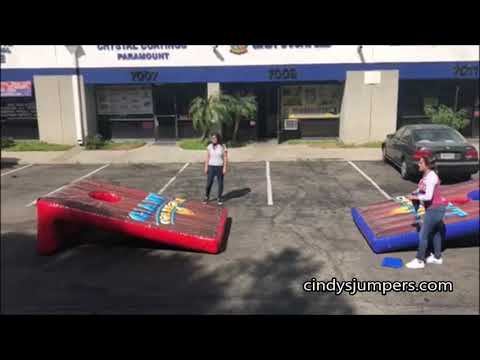Giant Inflatable Corn Hole Game Rental by Cindy's Jumpers