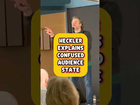 HECKLER EXPLAINS CONFUSED AUDIENCE STATUS