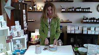 White Witch, Ruth Ruane, demonstrates how to make rose beads from petals.