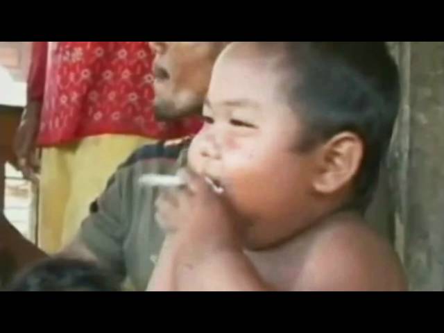 2-year-old Indonesian Baby Ardi Rizal smokes 40 cigarettes a day.. in rehab (Hi-Def) class=