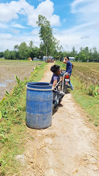 The boy was hiding inside the drum.
