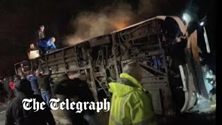 video: Dozens injured after bus carrying 70 workers overturns in Somerset