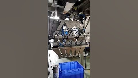 Multiheads weigher for multi discharge