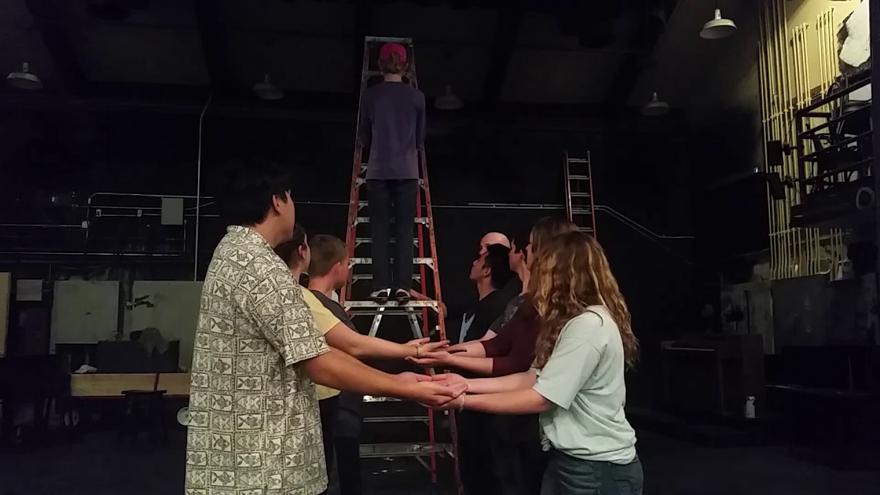 Trust falls off of a ladder. - YouTube