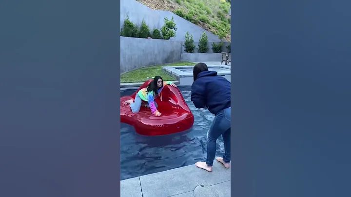 Dixie and Charli Damelio falls into the pool  #sho...