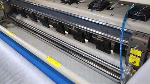 Ultrasonic quilting machine+polyester layers+wadding layers+ fiber fabric