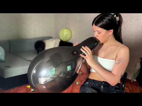 Cute Looner Girl Blows and Sits on Long Neck Balloons