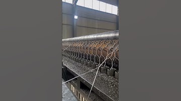 Baseball field safety net weaving machine is in production