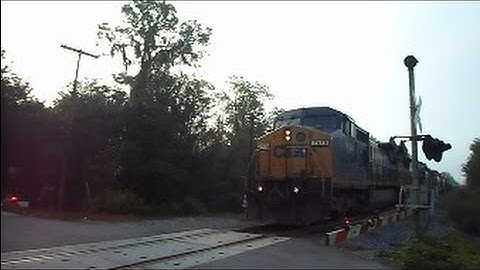 CSX Mixed Long Freight Train Trucking Along