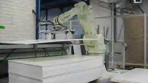 RFA Kawasaki Robotloader loading plastic plates in NC machine