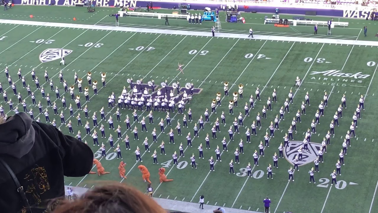 University of Washington’s Marching Band Plays “Walk the Dinosaur