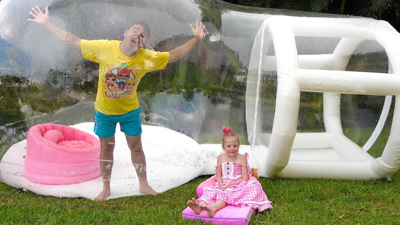 Nastya and dad play with a huge inflatable ball
