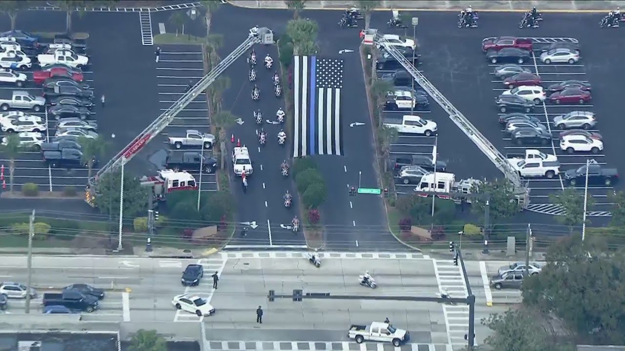 Funeral procession for fallen Lakeland PD officer Paul Dunn - YouTube