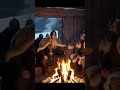 The fire crackles