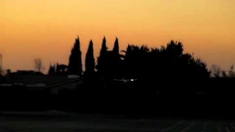 E-flite Apprentice RC Airplane with Headlights at Dusk