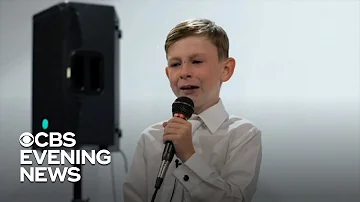 Emotional 9-year-old steals the show at sister's wedding