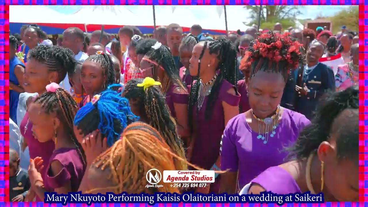 MARY NKUYOTO PERFORMING KAISIS OLAITORIANI ON A WEDDING CEREMONY.