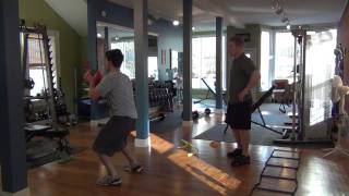 Medicine Ball Sprawl Squat Jumps