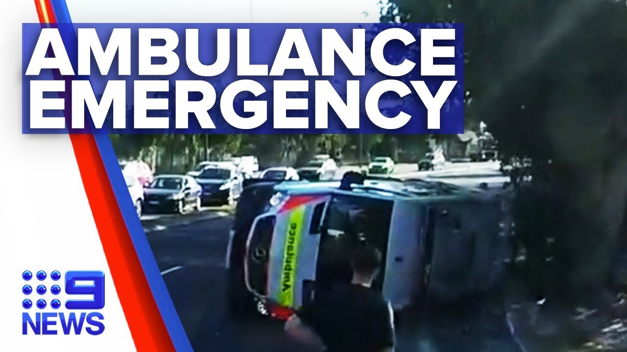 Racing ambulance collides with truck | Nine News Australia - YouTube
