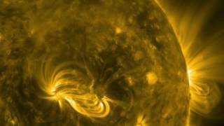 SDO Sees Brightening Magnetic Loops