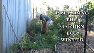 Harvesting cucumbers, composting plants, and preparing the garden beds for winter - with a snake!