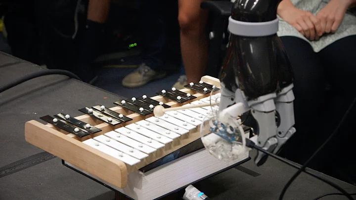 Stanford students teach robots to play dominoes, the xylophone