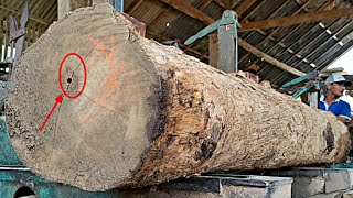surprised by unexpected discovery while sawing teak wood belonging to a furniture tycoon