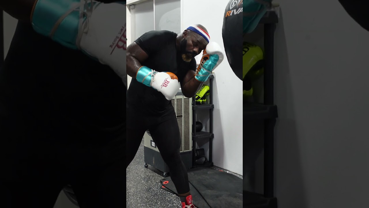 Carlos Takam And Coach Dewey working hard at the Split T Boxing Club in Las Vegas 