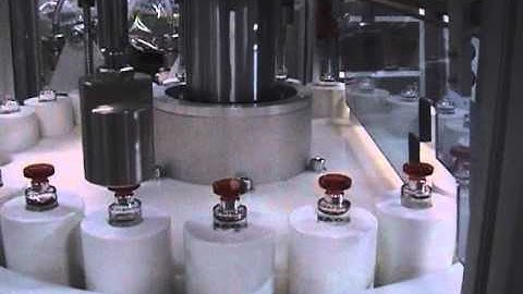 AUTOMATIC PERFUME FILLING CAPPING MACHINE. MOD. LA2 PERFUME MACHINERY