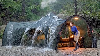 INTERESTING SPACE STATION SHAPED INFLATABLE TENT CAMPING WITH WOODSTOVE IN THE RAIN