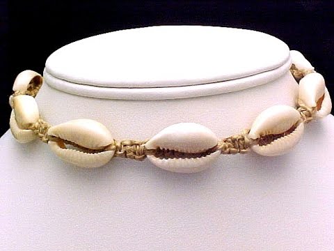 فيديو: كيفية وضع قذائف Cowrie على الفزع: 10 خطوات (بالصور)