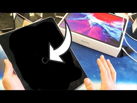 How do you fix a stuck spinning wheel on iPad?