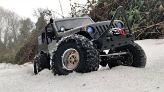 Axial Rc Scx10.2 Custom Jeep Wrangler Battling Through Snow