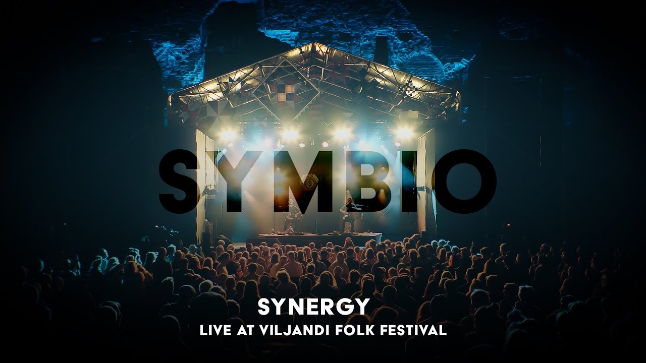 Watch SYMBIO OFFICIAL VIDEO: "Synergy" – Live at Viljandi Folk Festival 2024 on YouTube Watch SYMBIO OFFICIAL VIDEO: "Synergy" – Live at Viljandi Folk Festival 2024 on YouTube