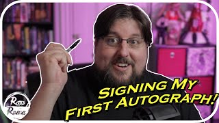 Giving my first autograph!