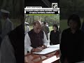 Union Defence Minister Rajnath Singh signs the visitors’ book at Seoul National Cemetery