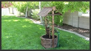 We have sprinkler pipes poking up in our yard. My solution was to purchase a wishing well lawn ornament to hide the pipes.