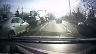 Close call mid-intersection lane change