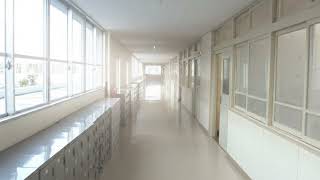 Sunday Morning by ILLIT, but you're in an empty school hallway in the morning