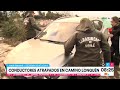 Vecino y Carabineros ayudan a conductora atrapada en camino a Lonquén | Tu Día | Canal 13
