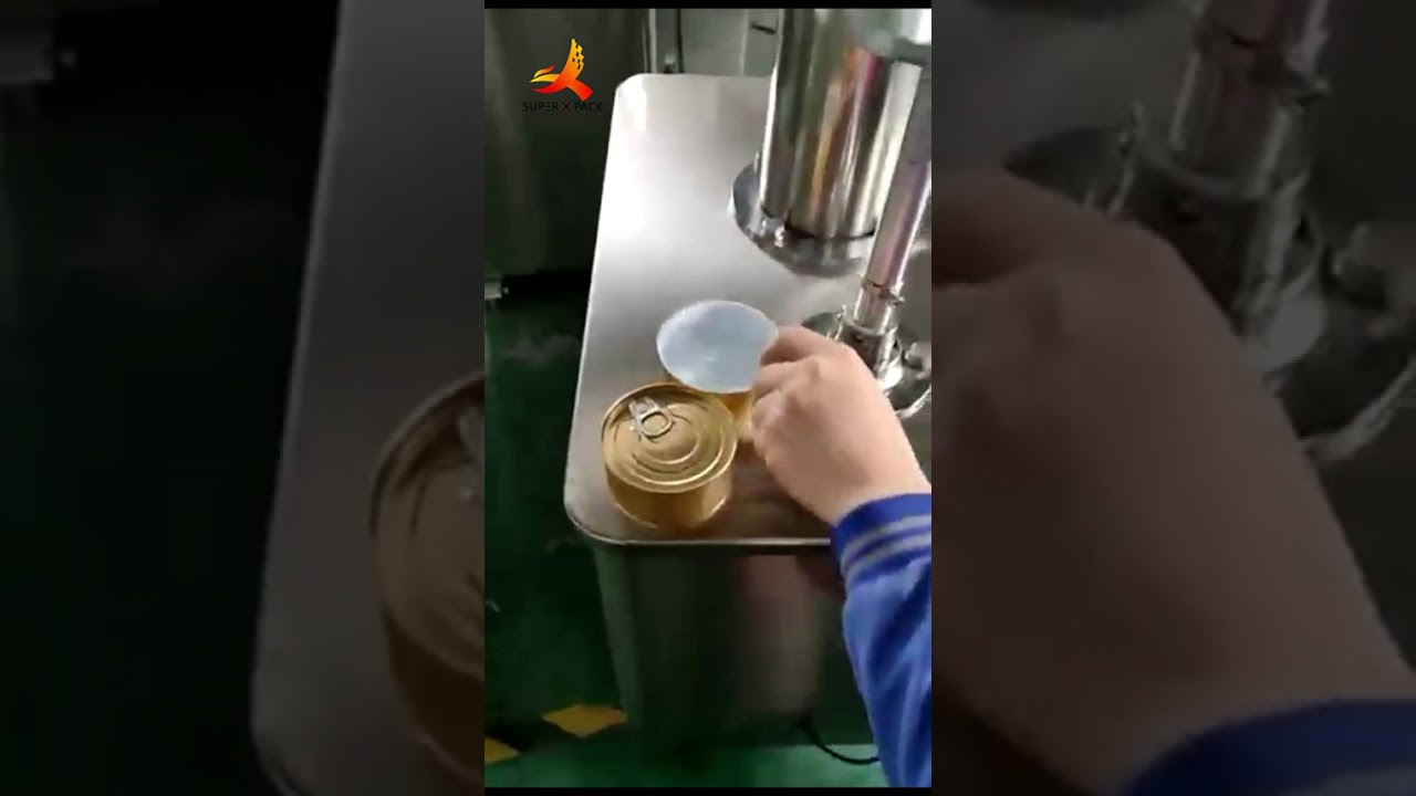 Machine semi-automatique de scellage de couvercles de boîtes de conserve rondes en métal