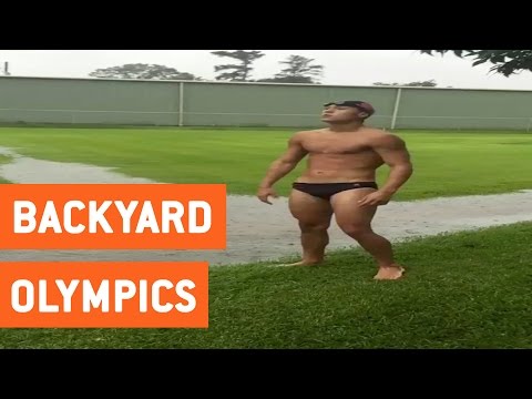 guy-goes-swimming-in-a-puddle-|-backyard-olympics