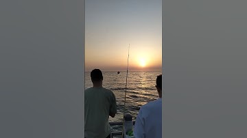 a beautiful sight the sun sinks into the ocean and the waves create a mesmerizing scene#short