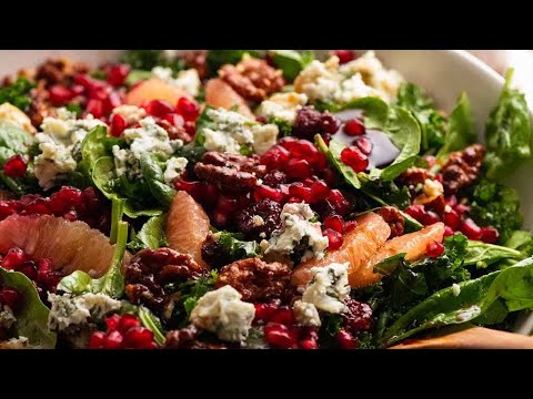 Pomegranate Salad - with Spinach, marinated kale, honey candied walnuts and blue cheese