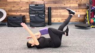 Block-Assisted Contralateral Straight-Leg Deadbug