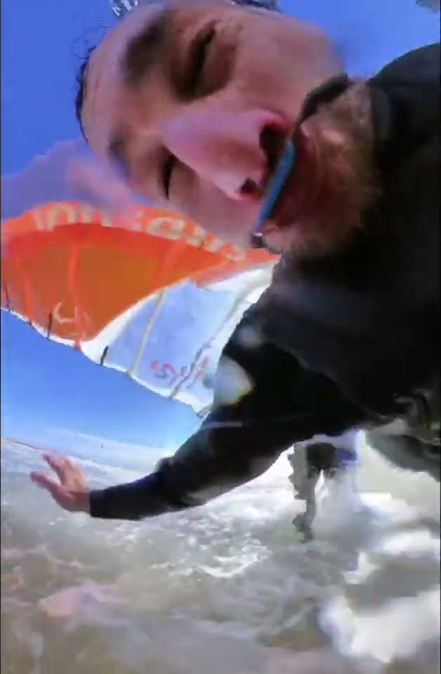 Kiteboarder Flies Beneath Windsurfer || ViralHog
