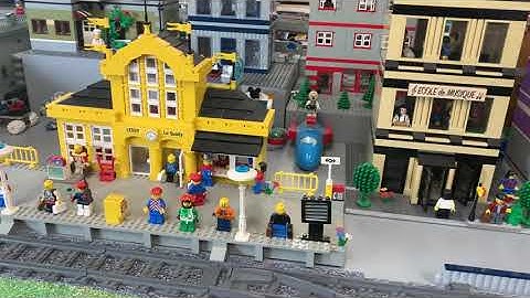 6 LEGO CITY Trains with Trixbrix curved tracks  around a small city.