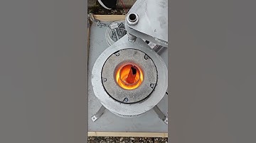 Adding copper to the crucible - Arvid Hjort