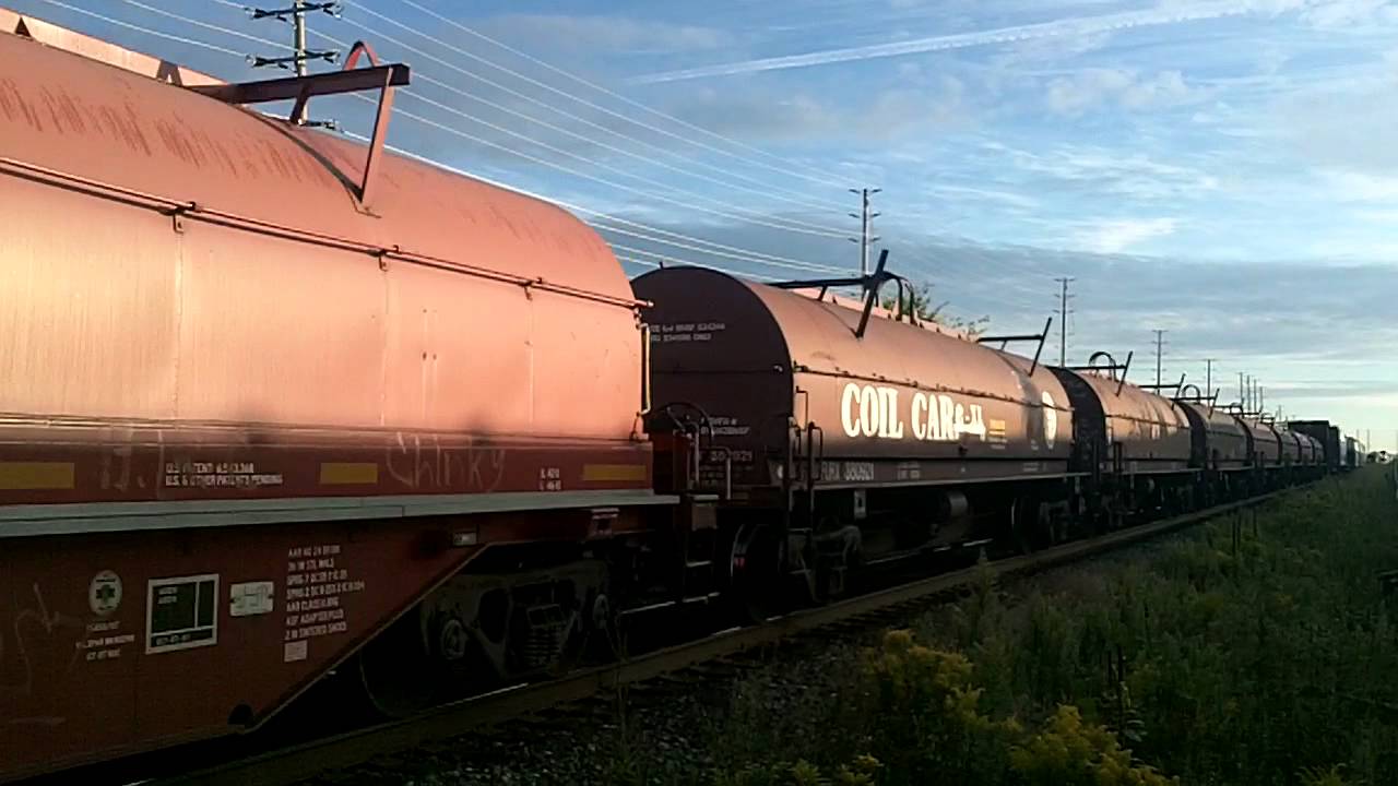 CP 246 w/ CEFX 1050 & SOO 6032 lead this long WB coil/mixed/Autoracker train by Lisgar GO