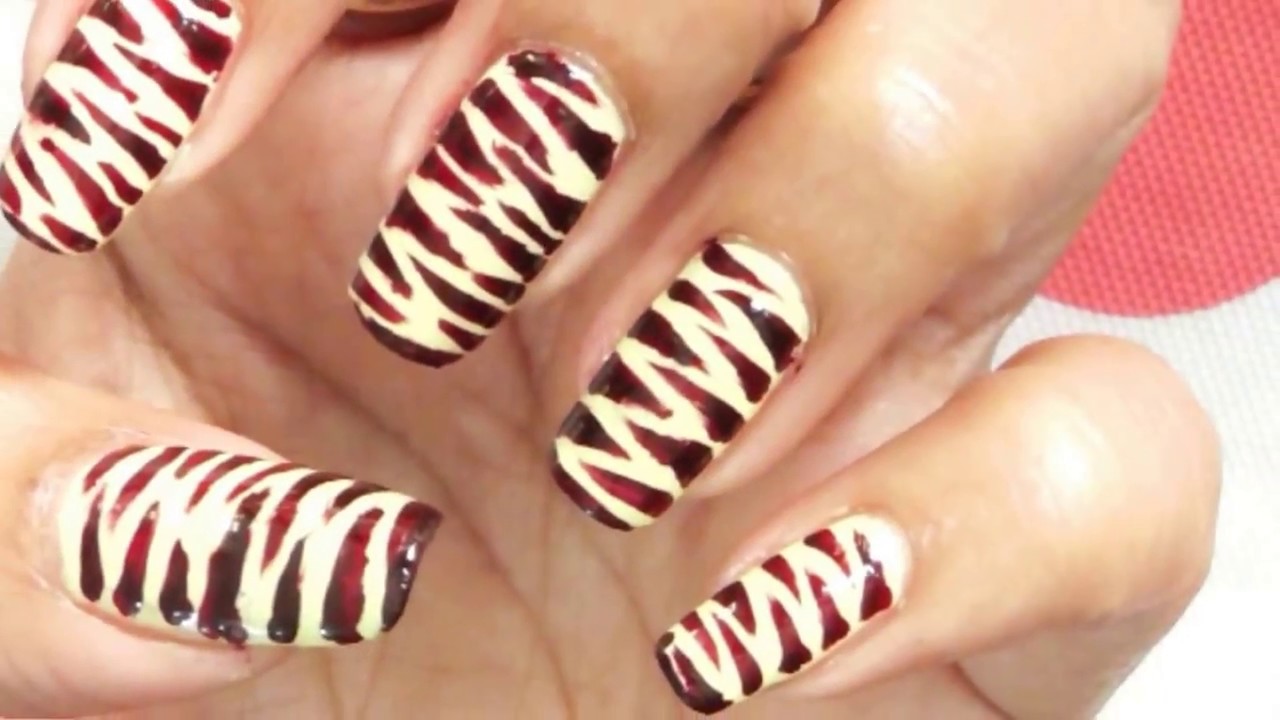 2. "Tiger Stripe Nail Art Design Ideas" - wide 4